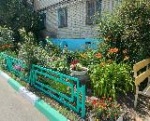 В номинации: "Самая благоустроенная территория многоквартирного жилого дома".
